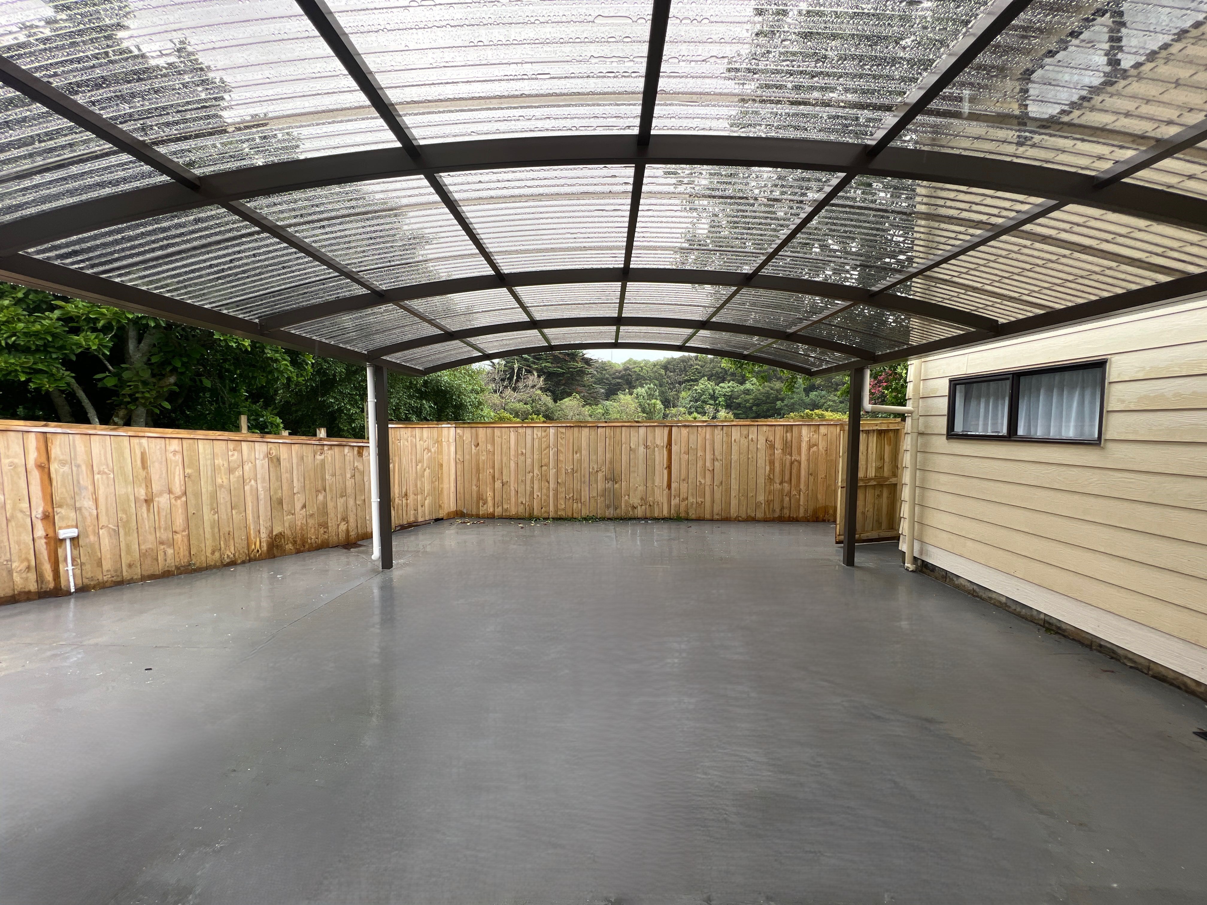 SUNVUE aluminium carport alongside a modern home